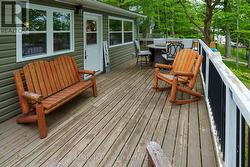 Front deck leading into front entry of the cottage - 