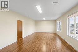 virtually staged to show the gym converted back to a rec room - 