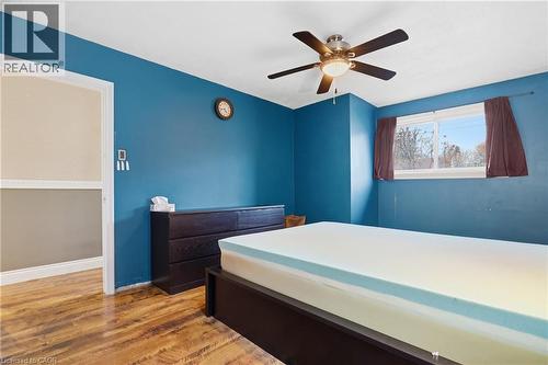 Bedroom with light wood-style flooring and a ceiling fan - 549 Weber Street E, Kitchener, ON 