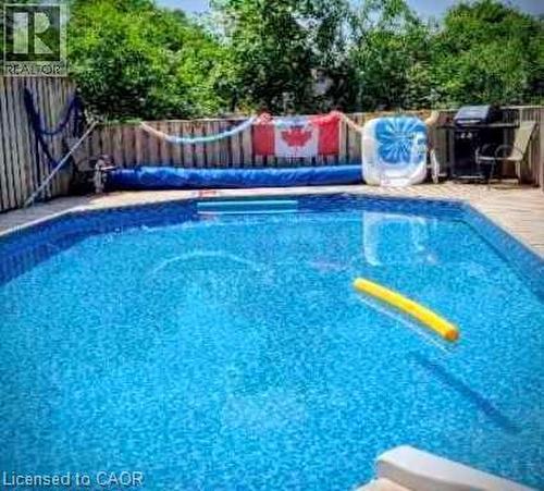 View of pool with a fenced backyard - 549 Weber Street E, Kitchener, ON 