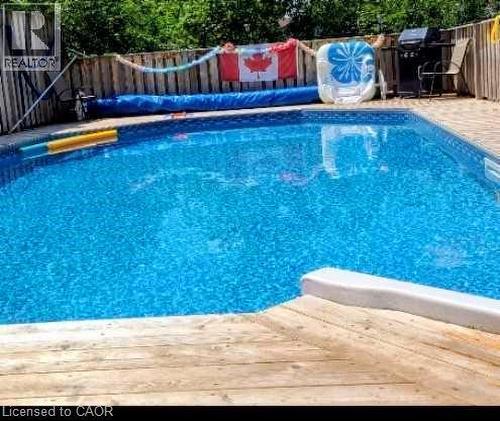 View of pool with a fenced backyard - 549 Weber Street E, Kitchener, ON 