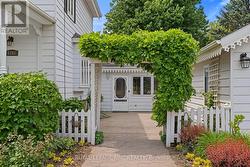Walk in the courtyard, enter the mudroom ahead. - 