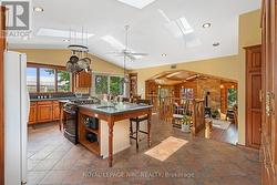 Spacious kitchen with 2 gas stoves & island w/sink - 