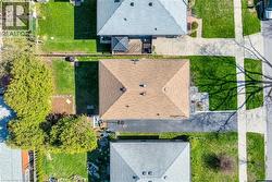 Aerial perspective showcasing the property's roofline and surrounding grounds - 