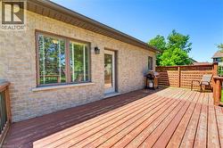 Expansive wood deck with a privacy fence - 