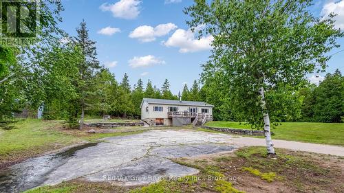 Plenty of parking - natural rock landscape - 68 Tamarac Road, Northern Bruce Peninsula, ON 