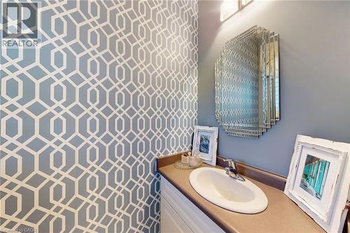 Convenient main floor powder room. - 6 Gaddye Lane, Binbrook, ON - Indoor Photo Showing Bathroom