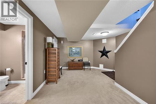 Professionally finished basement offers an abundance of extra living space. - 6 Gaddye Lane, Binbrook, ON - Indoor Photo Showing Other Room