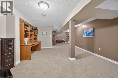 Neutral decor and carpeting. - 6 Gaddye Lane, Binbrook, ON - Indoor Photo Showing Other Room