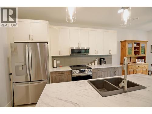 2744 Cedar Ridge Street, Lumby, BC - Indoor Photo Showing Kitchen With Double Sink