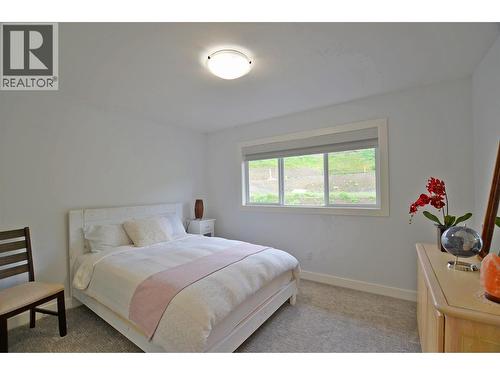 2744 Cedar Ridge Street, Lumby, BC - Indoor Photo Showing Bedroom