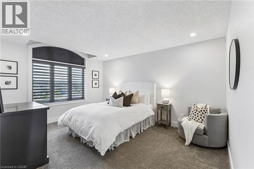 3rd bedroom on second storey with premium carpeting and Hunter Douglas blinds and ensuite bathroom - 95 Pondcliffe Drive, Kitchener, ON 