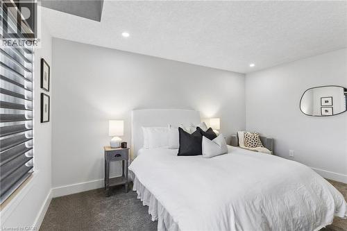 3rd bedroom on second storey with premium carpeting and Hunter Douglas blinds and ensuite bathroom - 95 Pondcliffe Drive, Kitchener, ON 