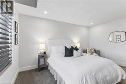 3rd bedroom on second storey with premium carpeting and Hunter Douglas blinds and ensuite bathroom - 