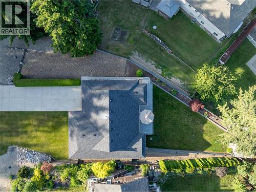 lots of parking in the flat driveway plus extra parking in the gravel driveway pad. - 2934 Juniper Crescent, Sorrento, BC 