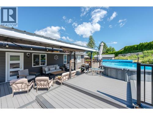 Back deck - 6763 Meadows Drive, Oliver, BC - Outdoor With Above Ground Pool With Deck Patio Veranda