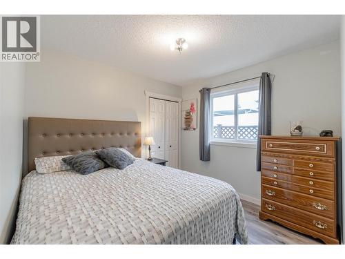 2nd bedroom - main level - 6763 Meadows Drive, Oliver, BC - Indoor Photo Showing Bedroom