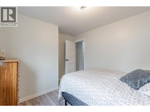 2nd bedroom - main level - 6763 Meadows Drive, Oliver, BC - Indoor Photo Showing Bedroom
