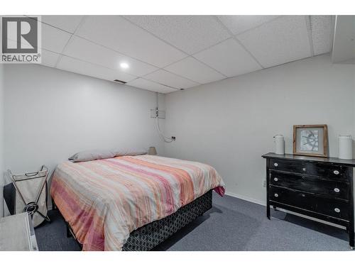 Basement den - 6763 Meadows Drive, Oliver, BC - Indoor Photo Showing Bedroom