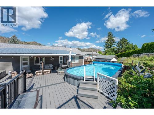 Open deck area - 6763 Meadows Drive, Oliver, BC - Outdoor With Above Ground Pool With Deck Patio Veranda