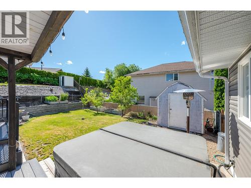 Hot tub, garden shed - 6763 Meadows Drive, Oliver, BC - Outdoor With Deck Patio Veranda With Exterior
