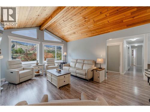 Front entry and living room - 6763 Meadows Drive, Oliver, BC - Indoor Photo Showing Living Room