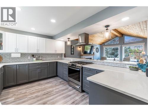 Kitchen main level - 6763 Meadows Drive, Oliver, BC - Indoor Photo Showing Kitchen With Upgraded Kitchen