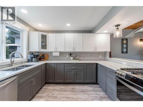 Kitchen main level - 6763 Meadows Drive, Oliver, BC - Indoor Photo Showing Kitchen With Double Sink