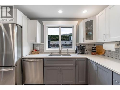Kitchen main level - 6763 Meadows Drive, Oliver, BC - Indoor Photo Showing Kitchen With Double Sink