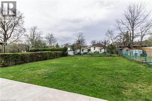 Expansive green lawn providing ample outdoor space - 20 West 1St Street, Hamilton, ON 