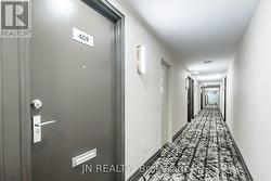 Hallway leading to Condo Unit - 