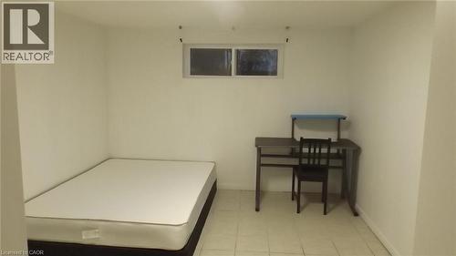 Room featuring white painted walls and light-colored tile flooring - 68 Austin Drive, Waterloo, ON - Indoor Photo Showing Other Room