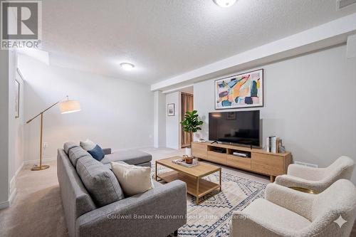 Virtually Staged -  Rec Room - 26 - 30 Imperial Road S, Guelph (Willow West/Sugarbush/West Acres), ON 