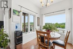 DINING AREA WITH PLENTY OF NATURAL LIGHT - 