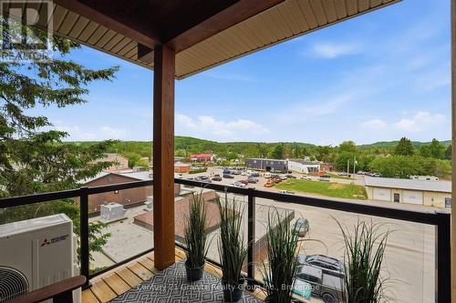 COVERED BALCONY/DECK WITH VIEWS OF THE RIVER - 303 - 9 Newcastle Street, Minden Hills (Minden), ON 