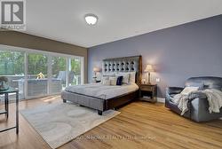 Large primary bedroom with access to the deck - 