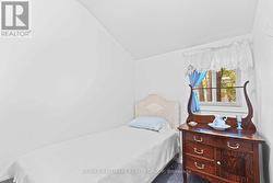 Cozy second bedroom with classic charm - 