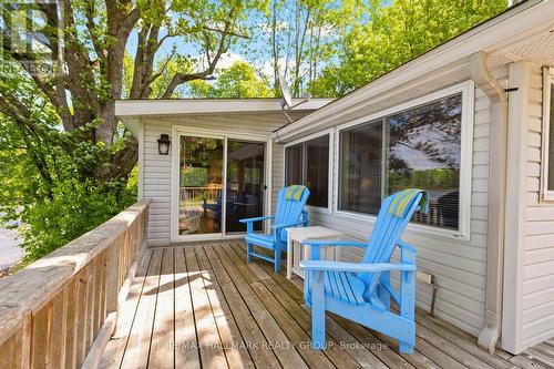 Spacious deck with seating and lake views - 118 Hall Shore Road, Lanark Highlands, ON 