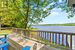 Elevated deck overlooking peaceful waters - 