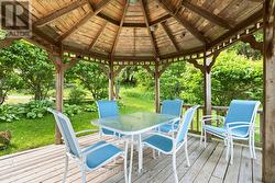 Covered gazebo ideal for outdoor dining - 