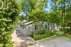 Side yard with greenery and walkway access - 