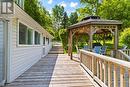 Wraparound deck connecting outdoor spaces - 118 Hall Shore Road, Lanark Highlands, ON 