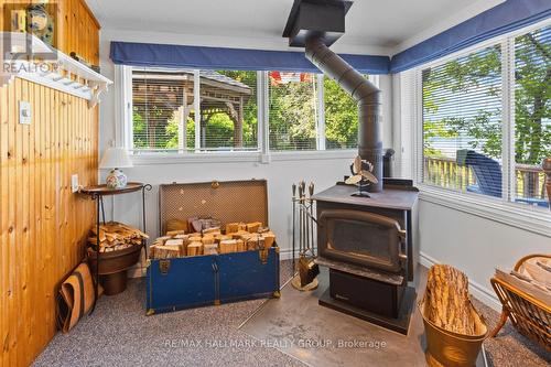 Cozy wood stove for warmth and comfort - 118 Hall Shore Road, Lanark Highlands, ON 