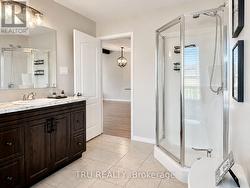 Main floor bathroom with a shower and bathtub - 