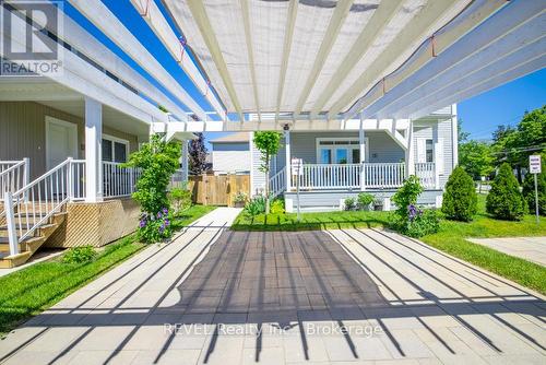 Easy access to the parking pad from the side door. - 1 Princeton Common Street, St. Catharines (Lakeport), ON 
