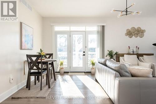 The floors are engineered hardwood. - 1 Princeton Common Street, St. Catharines (Lakeport), ON 