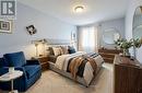 Primary Room - Virtually Staged - 304 - 131 Taunton Road E, Oshawa, ON  - Indoor Photo Showing Bedroom 