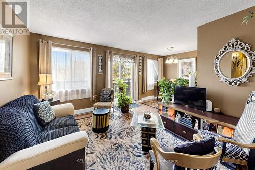 304 - 131 Taunton Road E, Oshawa, ON - Indoor Photo Showing Living Room