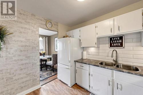 304 - 131 Taunton Road E, Oshawa, ON - Indoor Photo Showing Kitchen With Double Sink