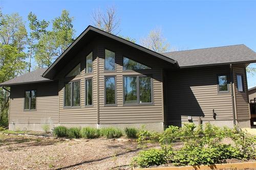 Front view of the house faces east. - 7 Dalvik Road, Gimli Rm, MB 